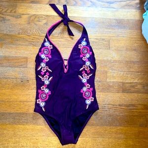 purple and pink floral one piece women’s bathing suit